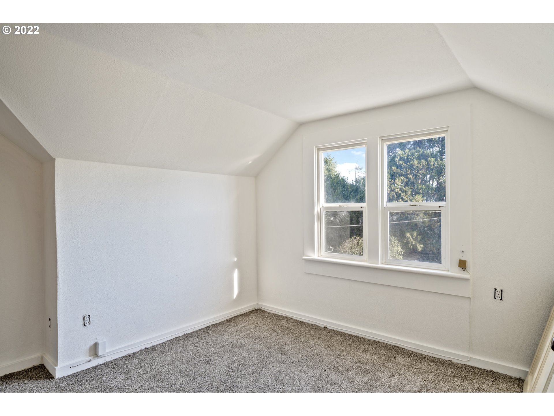 2110 Nielsen Road Tillamook, OR 97141 - Photo 21 of 26 a view of an empty room with a window