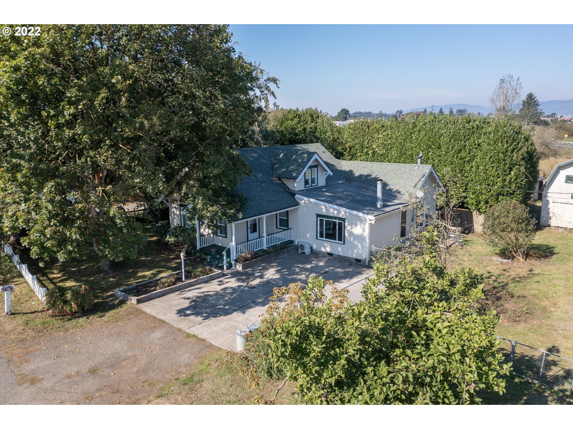 2110 Nielsen Road Tillamook, OR 97141 - Photo 3 of 26 a view of a house with a yard