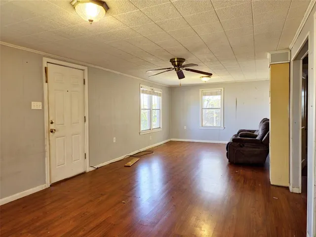 a view of livingroom with hardwood floor and window