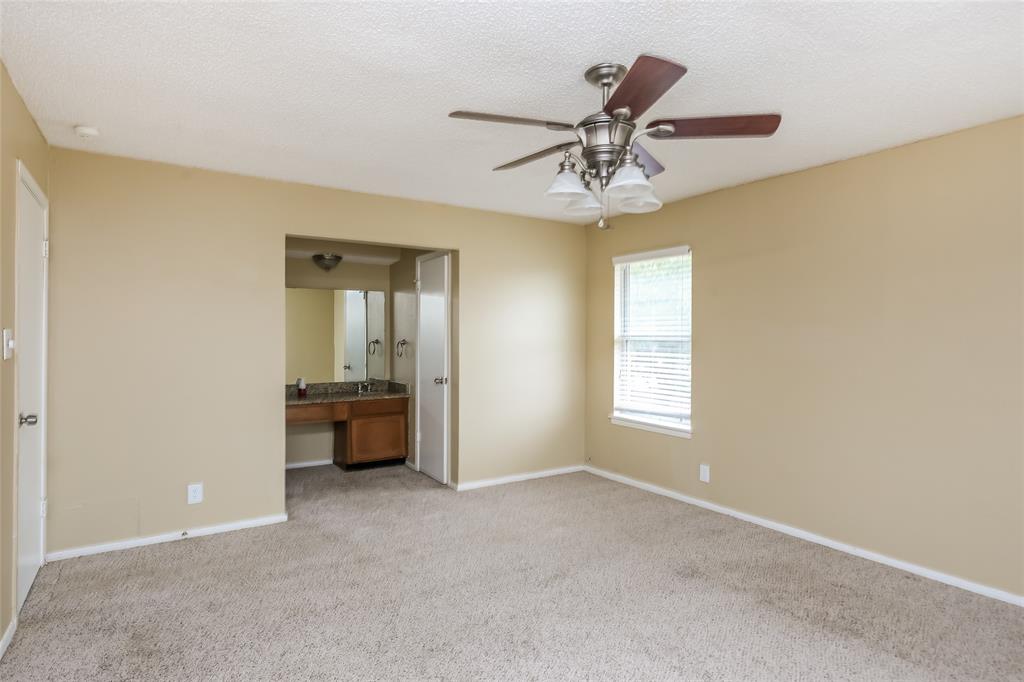 1130 Judy Avenue Benbrook, TX 76126 - Photo 7 of 17 a view of a livingroom with a ceiling fan and window