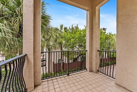 a view of a balcony with an outdoor space