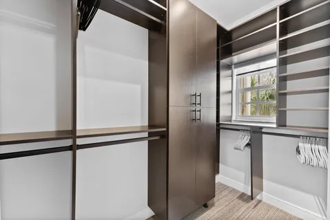a view of walk in closet with window