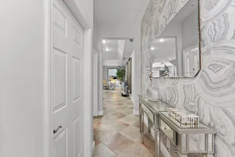 a view of an entryway with wooden floor