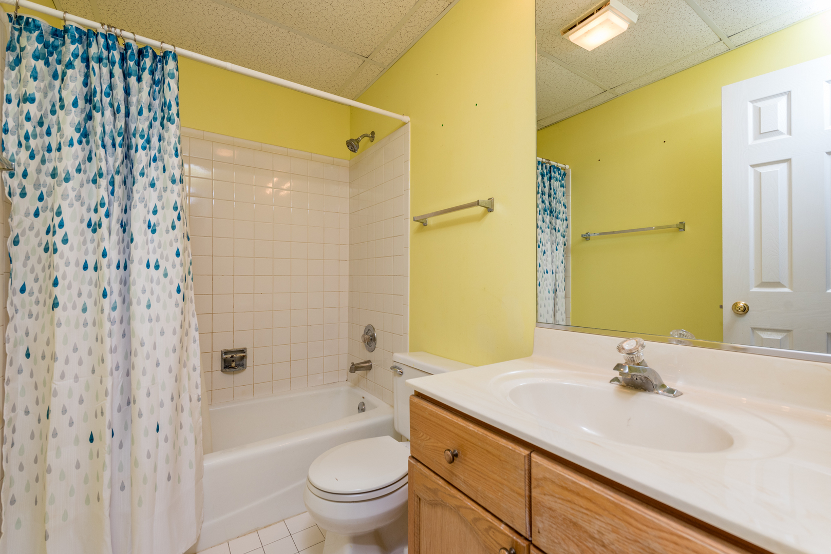 1146 Edgewater Lane Antioch, IL 60002 - Photo 18 of 23 a bathroom with a granite countertop sink a toilet and shower