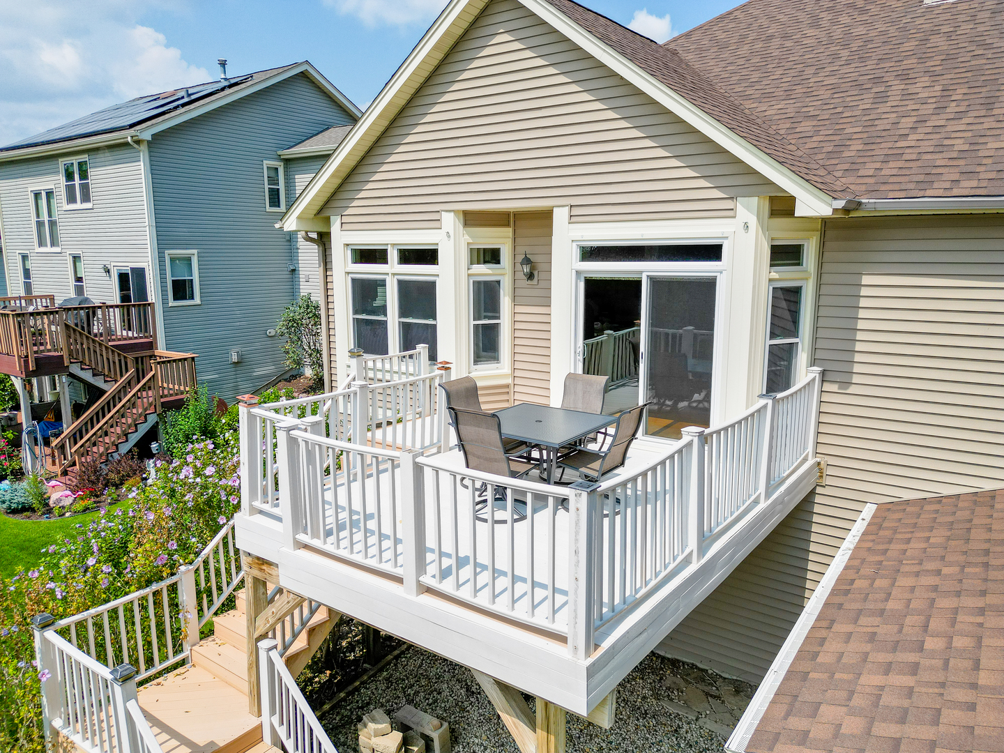 1146 Edgewater Lane Antioch, IL 60002 - Photo 22 of 23 a view of a house with wooden deck