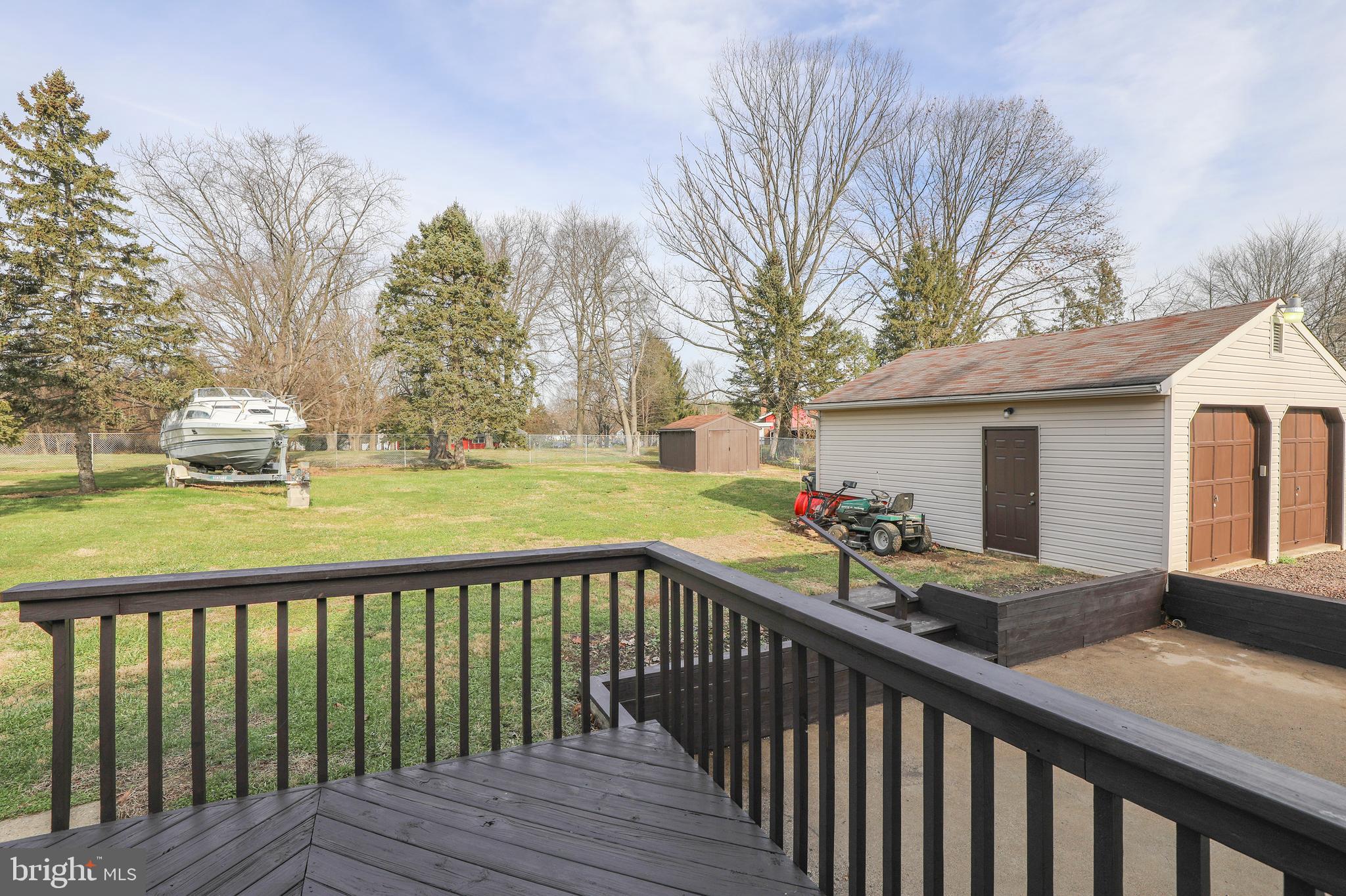 34 East Robin Road Holland, PA 18966 - Photo 29 of 38 Deck and view of large fenced yard.