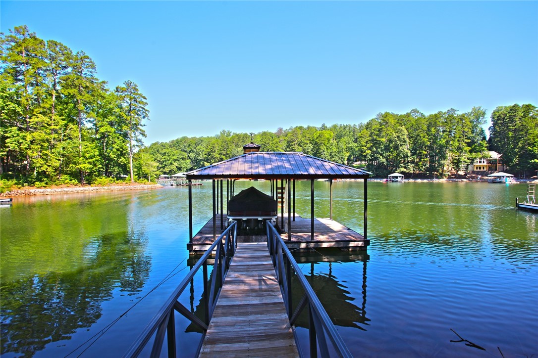 1359 Hbr Rdg Road Seneca, SC 29672 - Photo 21 of 39 Boathouse with a walkway offers direct lake access for water activities.