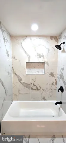 a front view of a house with garage