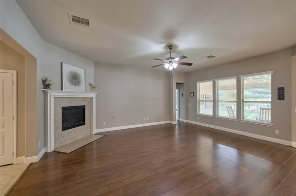 a view of a swimming pool with a patio