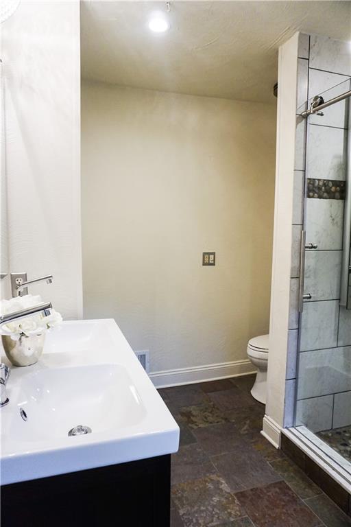 826 Belmont Road Butler, PA 16001 - Photo 14 of 20 SPA LIKE OWNERS BATH COMPLETE WITH GLASS AND TILE ENCLOSED SHOWER