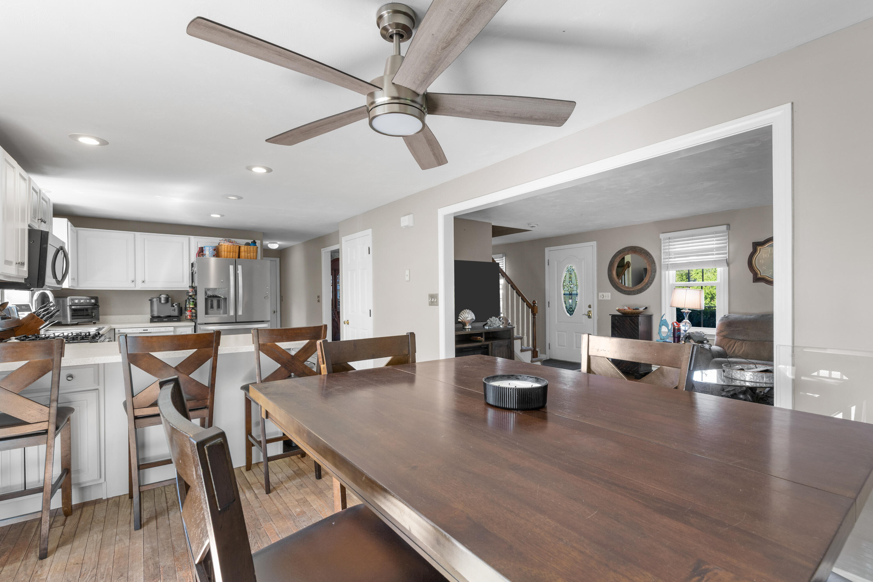30 Sheffield Place Mashpee, MA 02649 - Photo 11 of 38 a view of a dining room with furniture and wooden floor