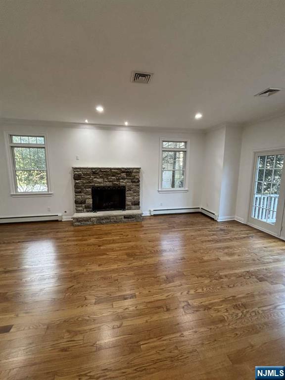 124 Coopers Lane River Vale, NJ 07675 - Photo 14 of 25 an empty room with windows and fireplace