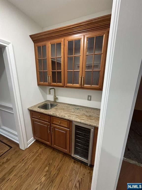 124 Coopers Lane River Vale, NJ 07675 - Photo 17 of 25 a view of an empty room with wooden floor and a window