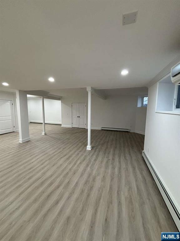 124 Coopers Lane River Vale, NJ 07675 - Photo 19 of 25 a view of empty room with wooden floor
