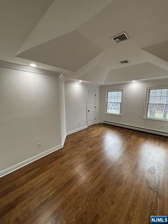 124 Coopers Lane River Vale, NJ 07675 - Photo 23 of 25 an empty room with wooden floor and windows