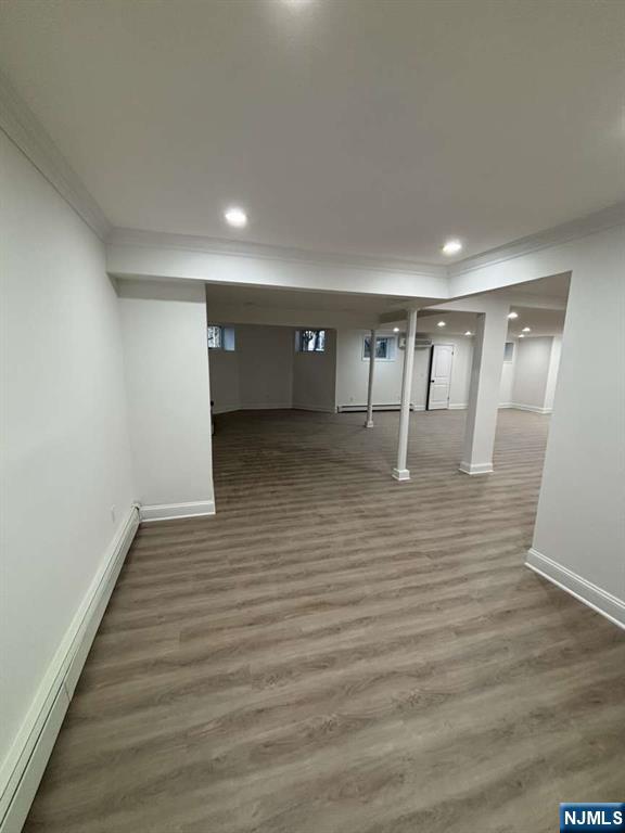 124 Coopers Lane River Vale, NJ 07675 - Photo 25 of 25 a view of an empty room with wooden floor