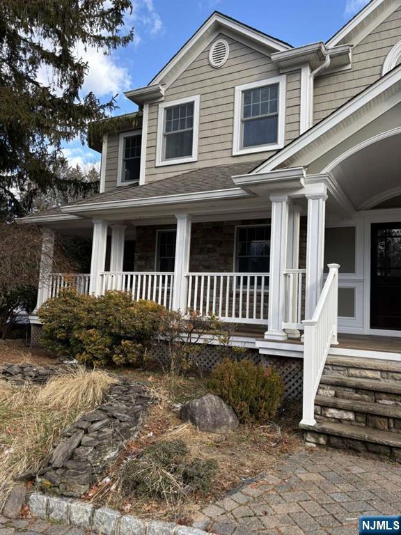 124 Coopers Lane River Vale, NJ 07675 - Photo 3 of 25 a front view of a house with a yard