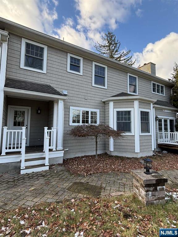 124 Coopers Lane River Vale, NJ 07675 - Photo 5 of 25 a front view of a house with a yard