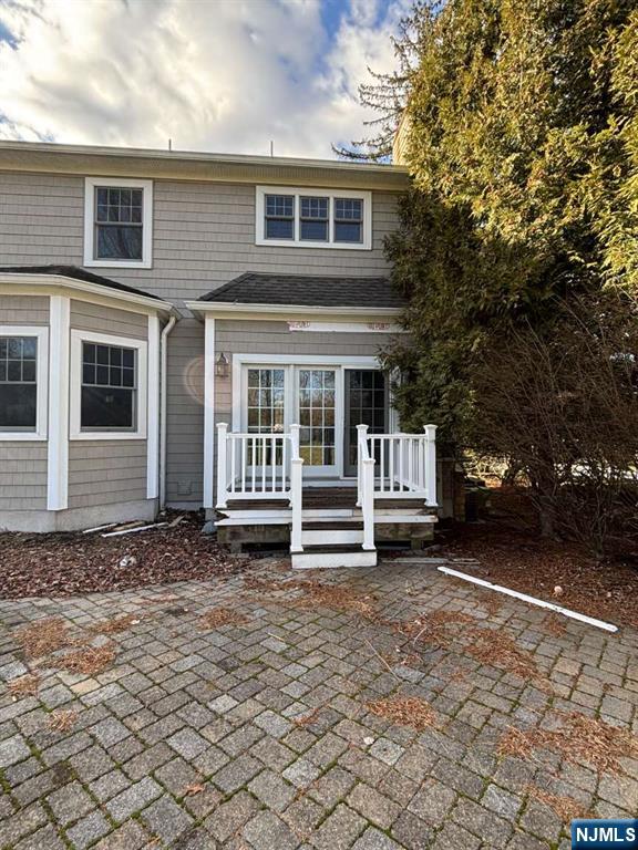 124 Coopers Lane River Vale, NJ 07675 - Photo 7 of 25 a front view of a house with a yard
