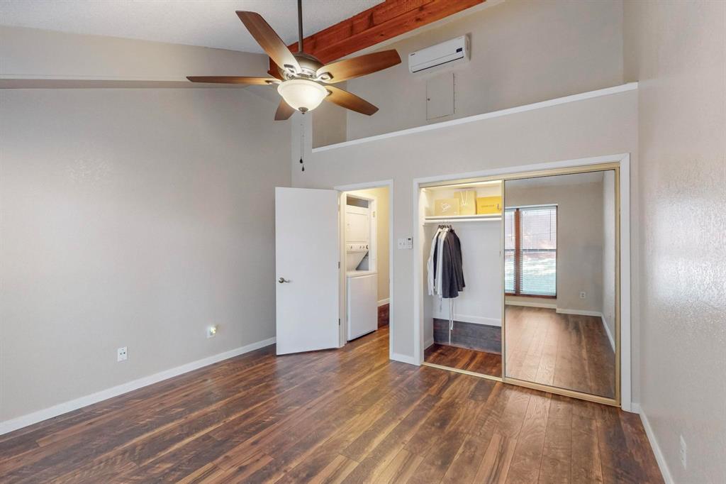 2569 Shady Ridge Drive Bedford, TX 76021 - Photo 27 of 38 wooden floor in an empty room with a window