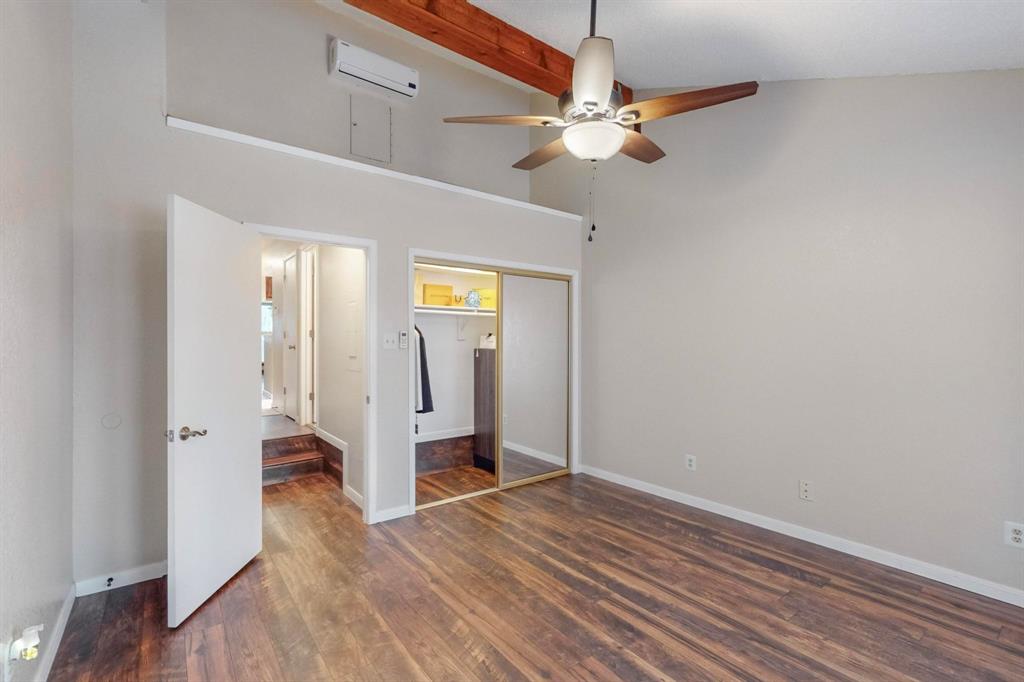 2569 Shady Ridge Drive Bedford, TX 76021 - Photo 30 of 38 wooden floor in an empty room with a window