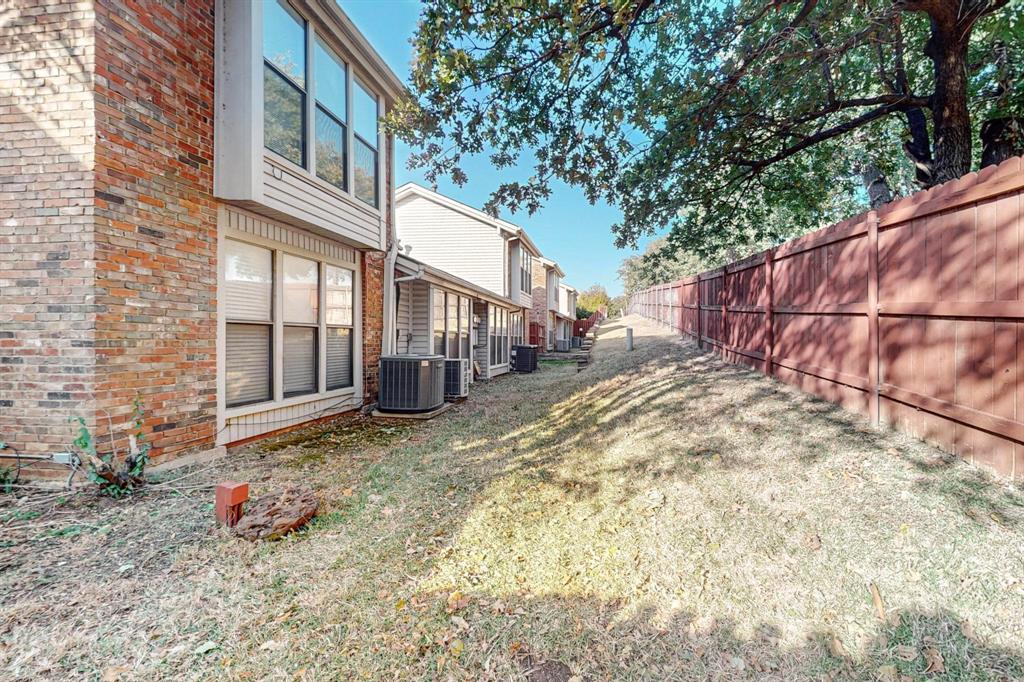 2569 Shady Ridge Drive Bedford, TX 76021 - Photo 37 of 38 a view of a house with a yard and sitting area
