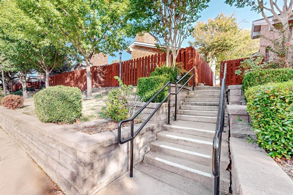 2569 Shady Ridge Drive Bedford, TX 76021 - Photo 5 of 38 a view of a garden with potted plants