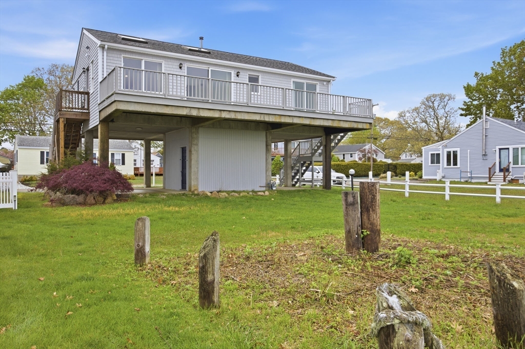 192 Swifts Beach Road Wareham, MA 02571 - Photo 9 of 38 a front view of a house with a yard
