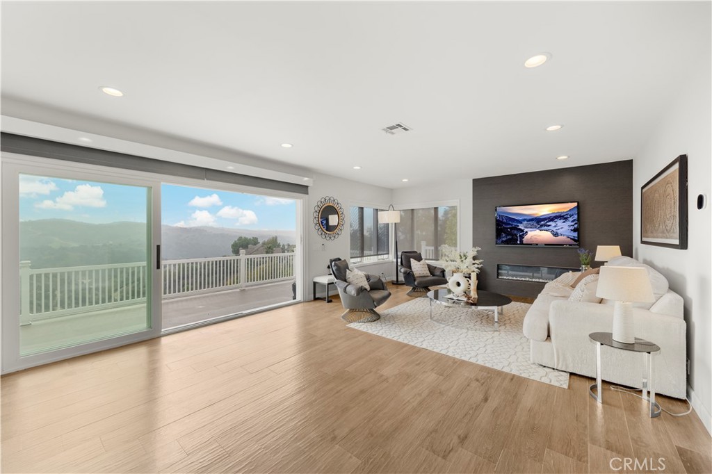 2640 Shady Ridge Lane Diamond Bar, CA 91765 - Photo 12 of 57 a living room with furniture and a flat screen tv