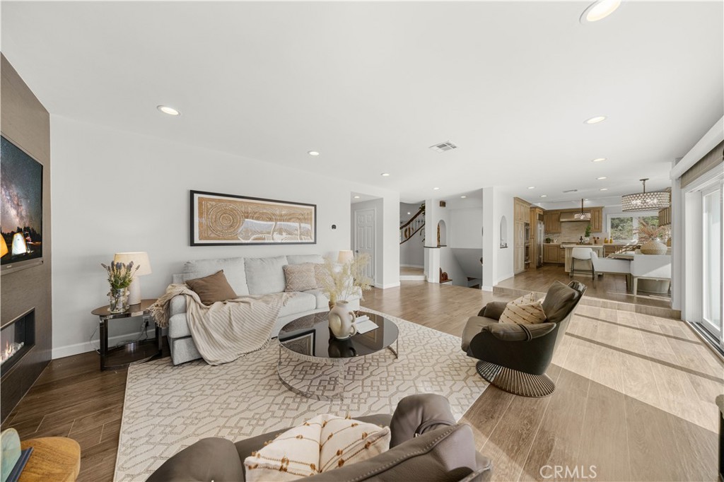 2640 Shady Ridge Lane Diamond Bar, CA 91765 - Photo 18 of 57 a living room with furniture or couch and a wooden floor