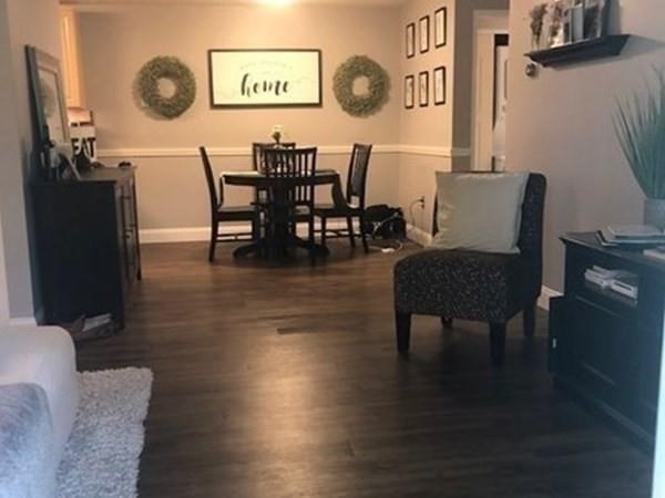 46 Silver Hill Lane, Unit 2 Natick, MA 01760 - Photo 9 of 23 a view of a dining room with furniture and wooden floor