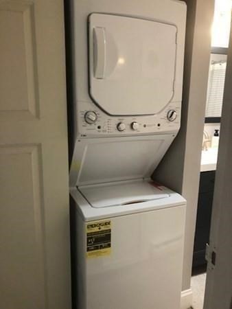 46 Silver Hill Lane, Unit 2 Natick, MA 01760 - Photo 10 of 23 a utility room with dryer and washer