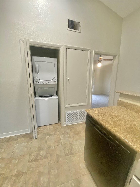 2216 San Gabriel Street, Unit 304 Austin, TX 78705 - Photo 16 of 24 Laundry area featuring stacked washer / drying machine, a ceiling fan, visible vents, and laundry area