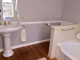 Broadway Burlingame, CA 94010 - Photo 21 of 21 a bathroom with a sink and a mirror