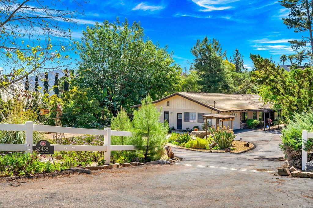 2435 Dehesa Road El Cajon, CA 92019 - Photo 1 of 1 front view of a house with a street