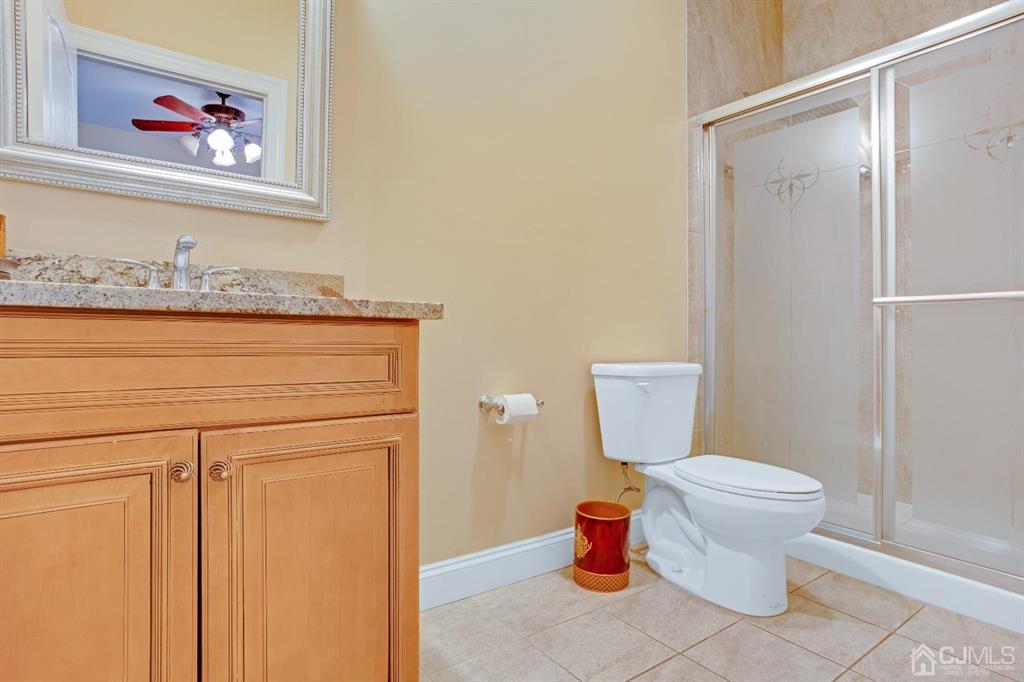 14 Harding Avenue Edison, NJ 08820 - Photo 19 of 41 a bathroom with a toilet and a shower