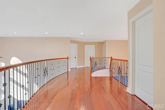 a view of entryway with wooden floor