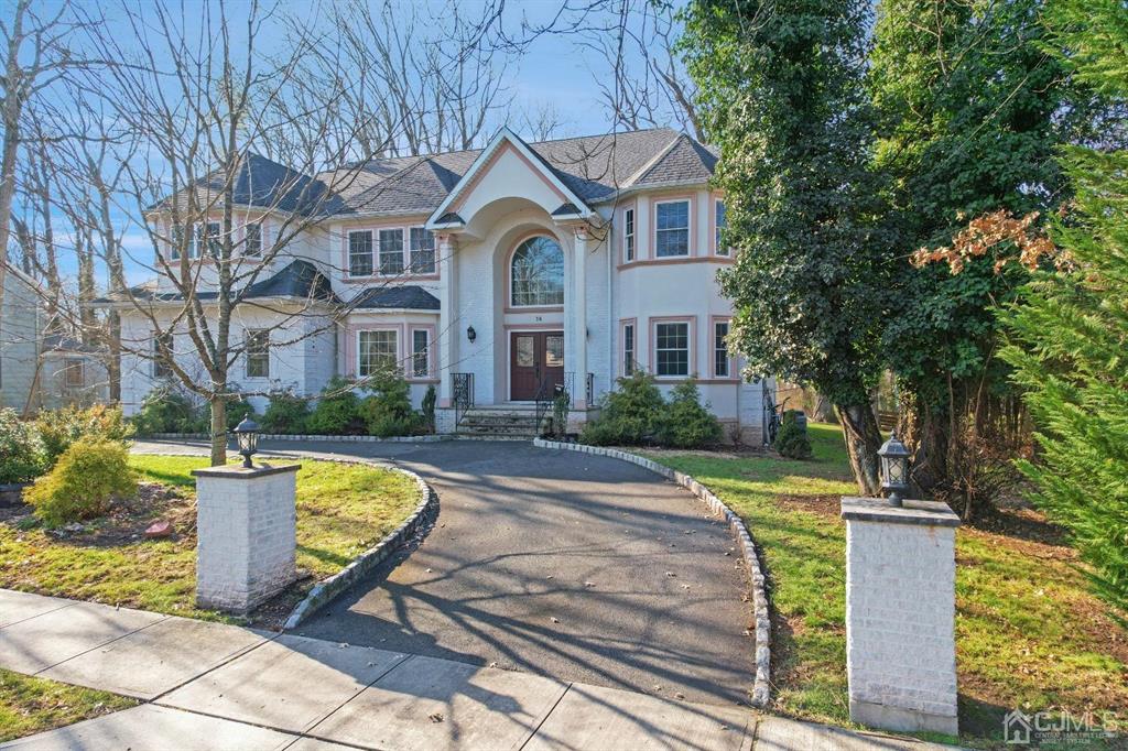14 Harding Avenue Edison, NJ 08820 - Photo 2 of 41 a front view of a house with swimming pool and porch