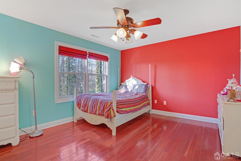 14 Harding Avenue Edison, NJ 08820 - Photo 27 of 41 a living room with furniture and chandelier