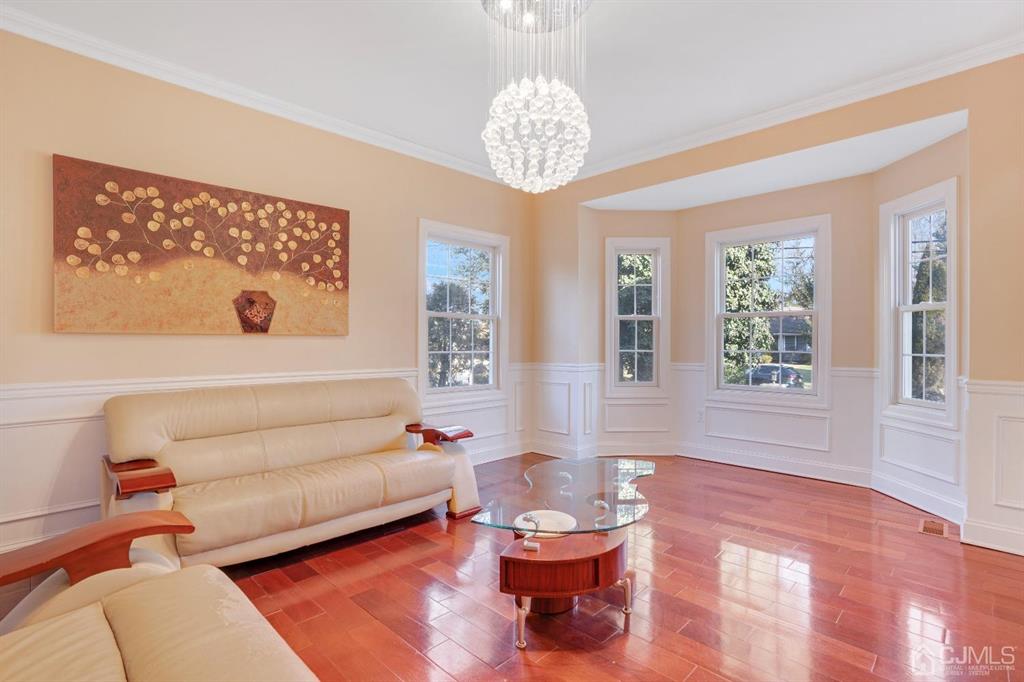 14 Harding Avenue Edison, NJ 08820 - Photo 5 of 41 a living room with furniture and a large window