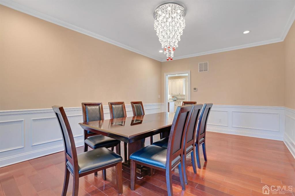 14 Harding Avenue Edison, NJ 08820 - Photo 7 of 41 a view of a dining room with furniture and chandelier