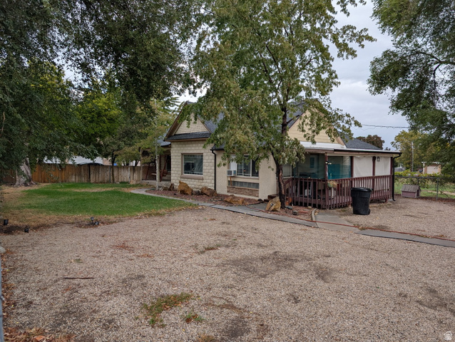 1341 East Crk Road Sandy, UT 84093 - Photo 8 of 24 Back of property with roof with shingles