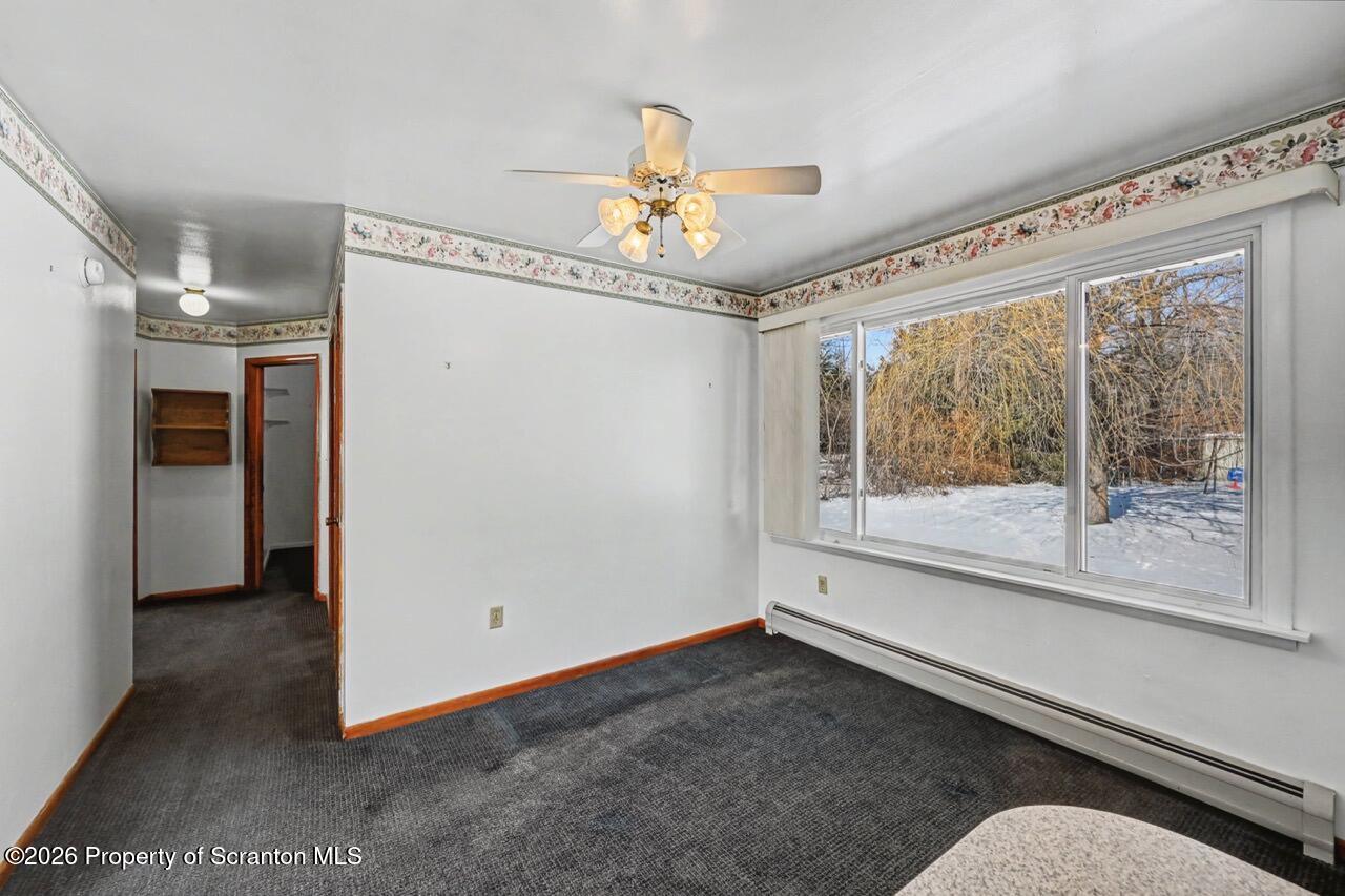 30 Glinko Street Scranton, PA 18504 - Photo 17 of 41 wooden floor in an empty room with a window