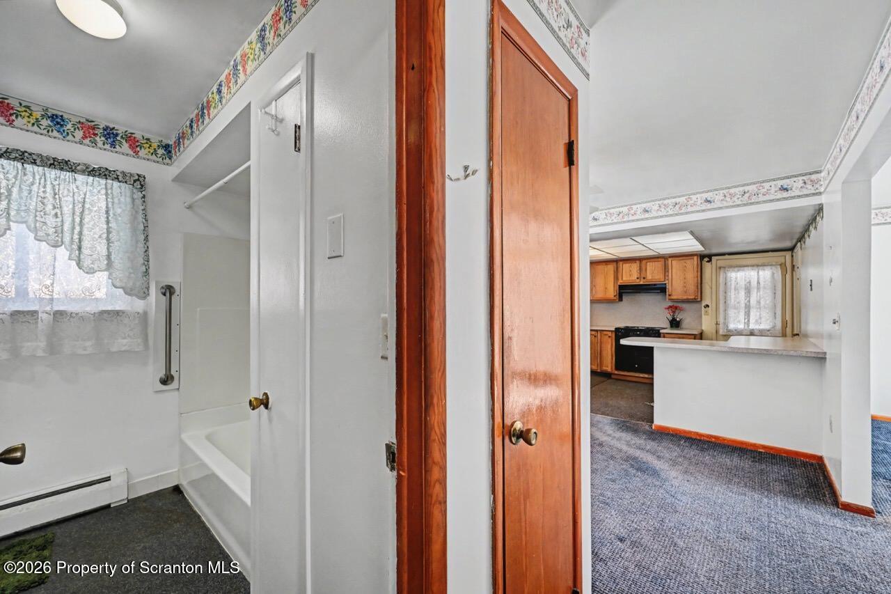 30 Glinko Street Scranton, PA 18504 - Photo 23 of 41 a bathroom with a white tub shower and sink