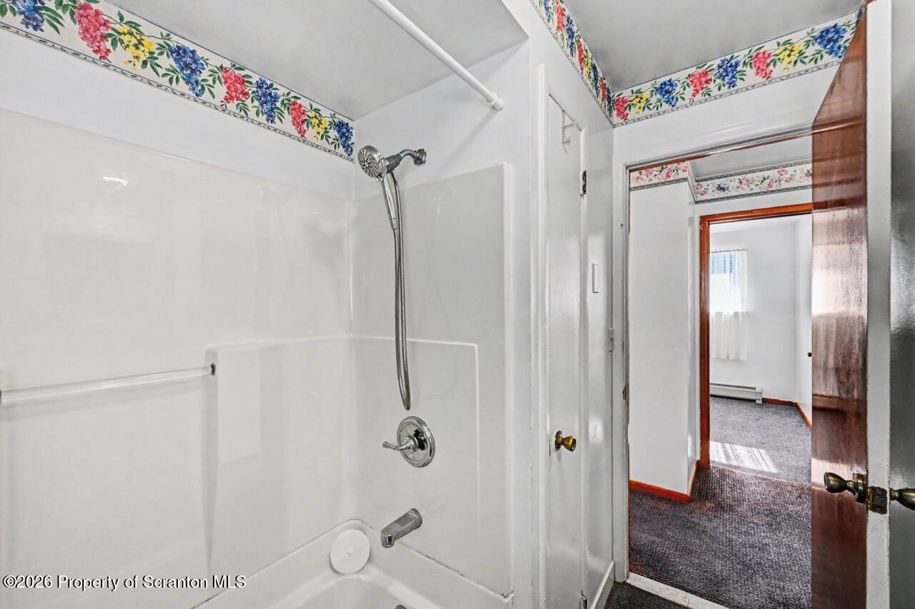 30 Glinko Street Scranton, PA 18504 - Photo 26 of 41 a bathroom with a shower and a mirror