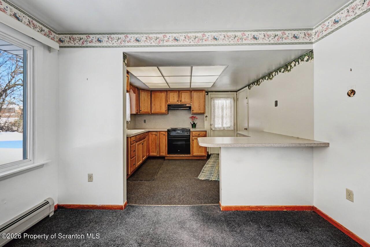30 Glinko Street Scranton, PA 18504 - Photo 10 of 41 a kitchen with a refrigerator and a stove