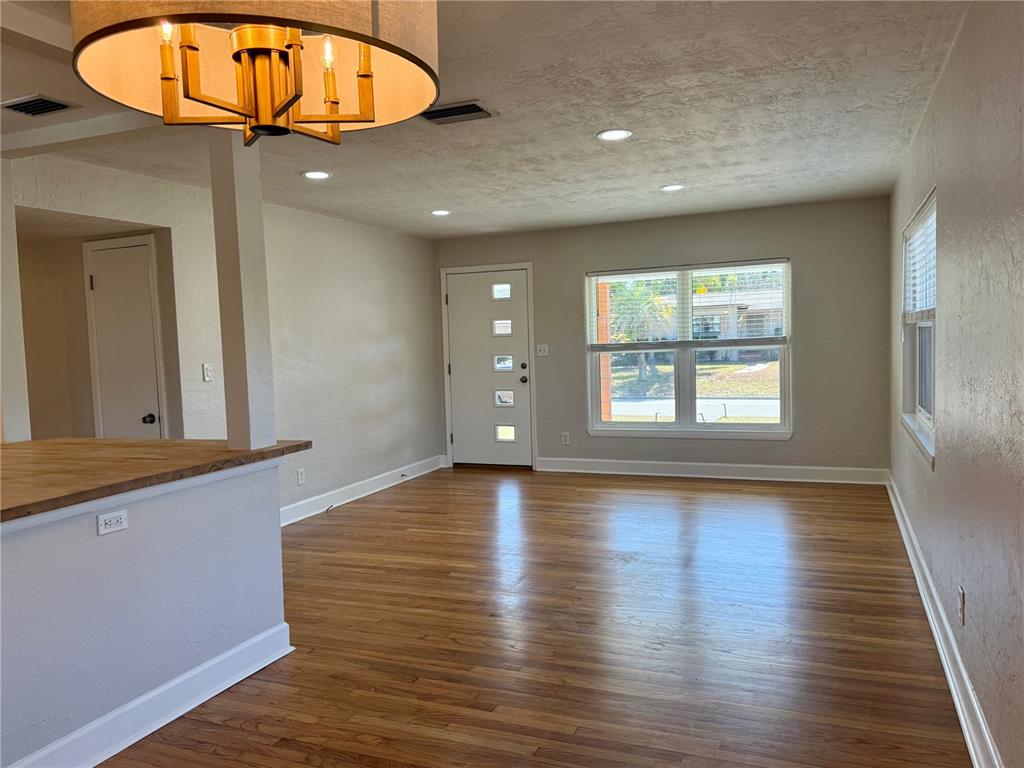 2801 Nancy Street Orlando, FL 32806 - Photo 11 of 39 an entryway door with wooden floor