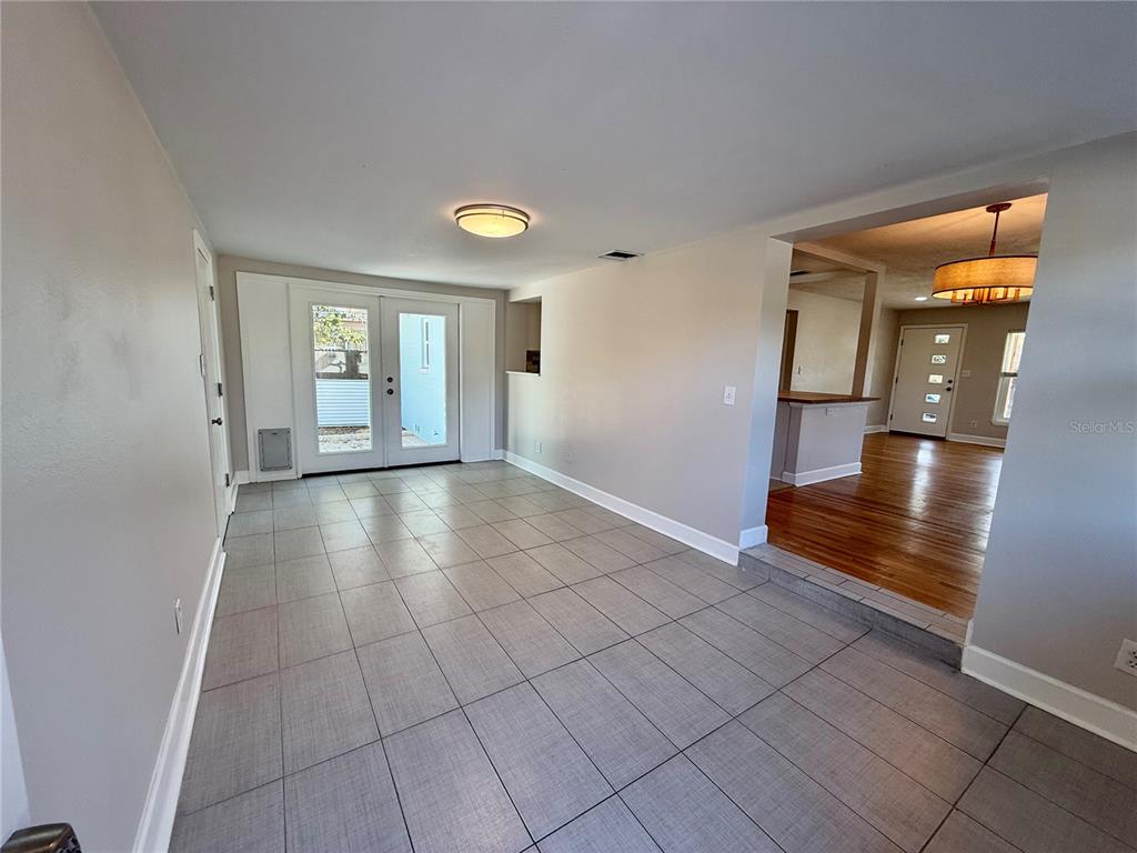 2801 Nancy Street Orlando, FL 32806 - Photo 16 of 39 wooden floor in an empty room with a window