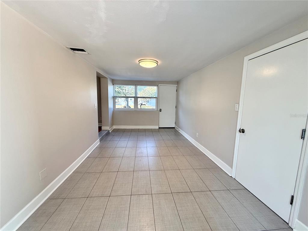 2801 Nancy Street Orlando, FL 32806 - Photo 17 of 39 a view of an empty room with a window