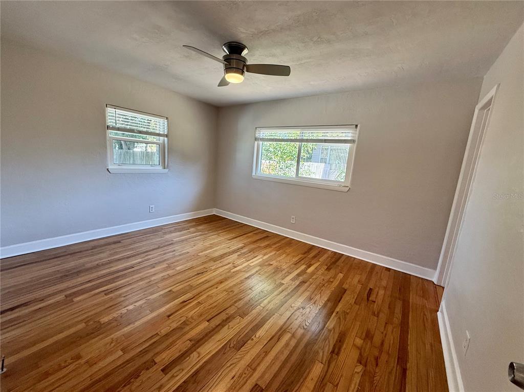2801 Nancy Street Orlando, FL 32806 - Photo 19 of 39 a view of empty room with wooden floor